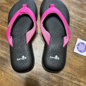 Sanuk Pink and Black Flip Flops